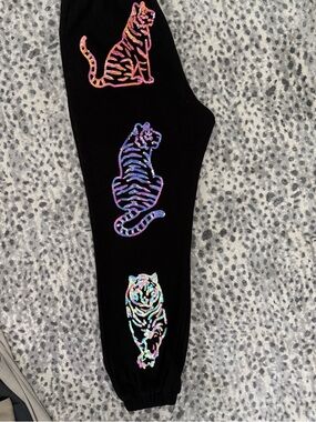 QUEEN OF SPARKLES Black Joggers with Multicolor Tiger Appliqués
